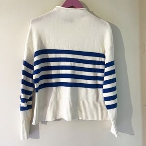 Blue and white striped mock neck sweater